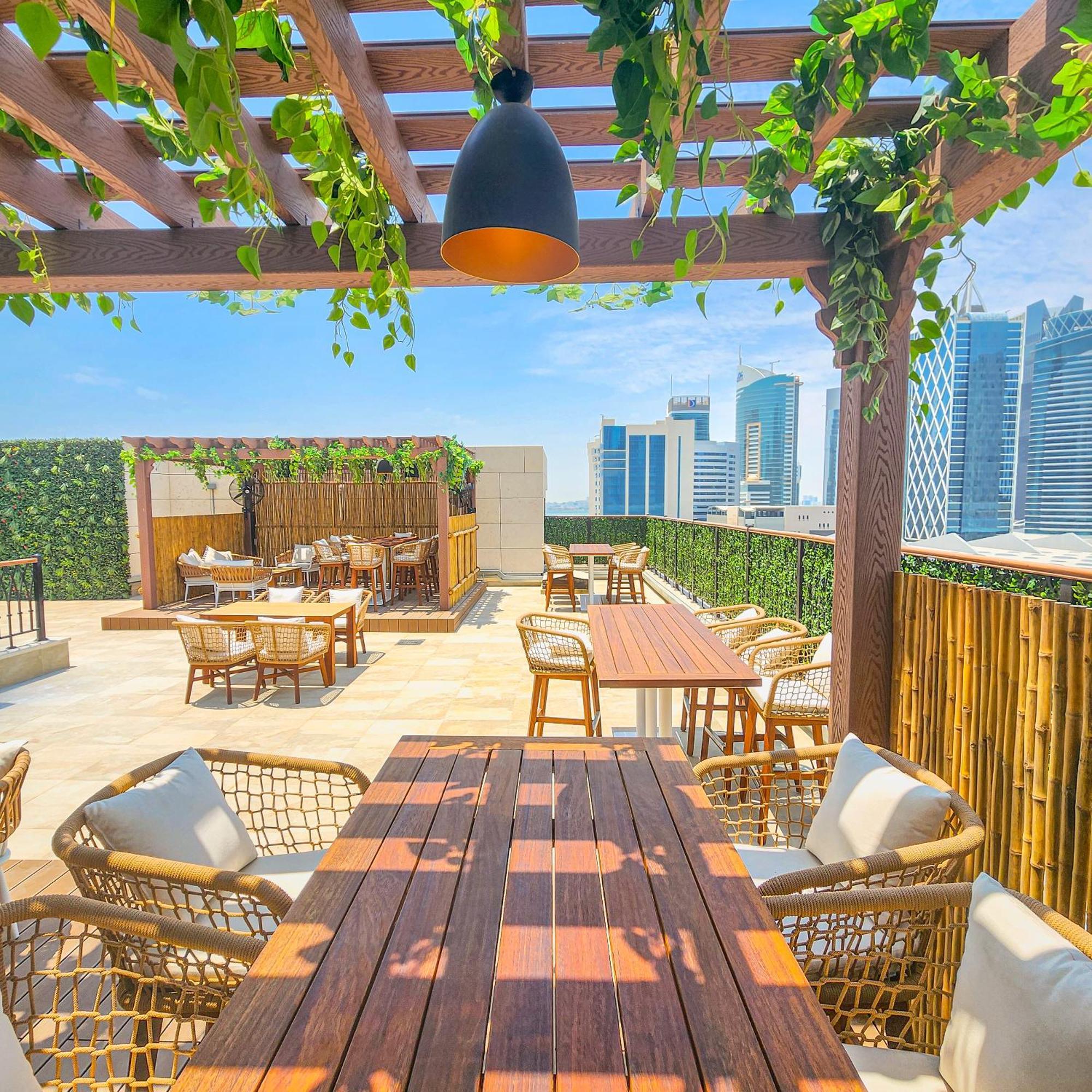 City Centre Rotana Doha Kültér fotó The rooftop bar at the hotel